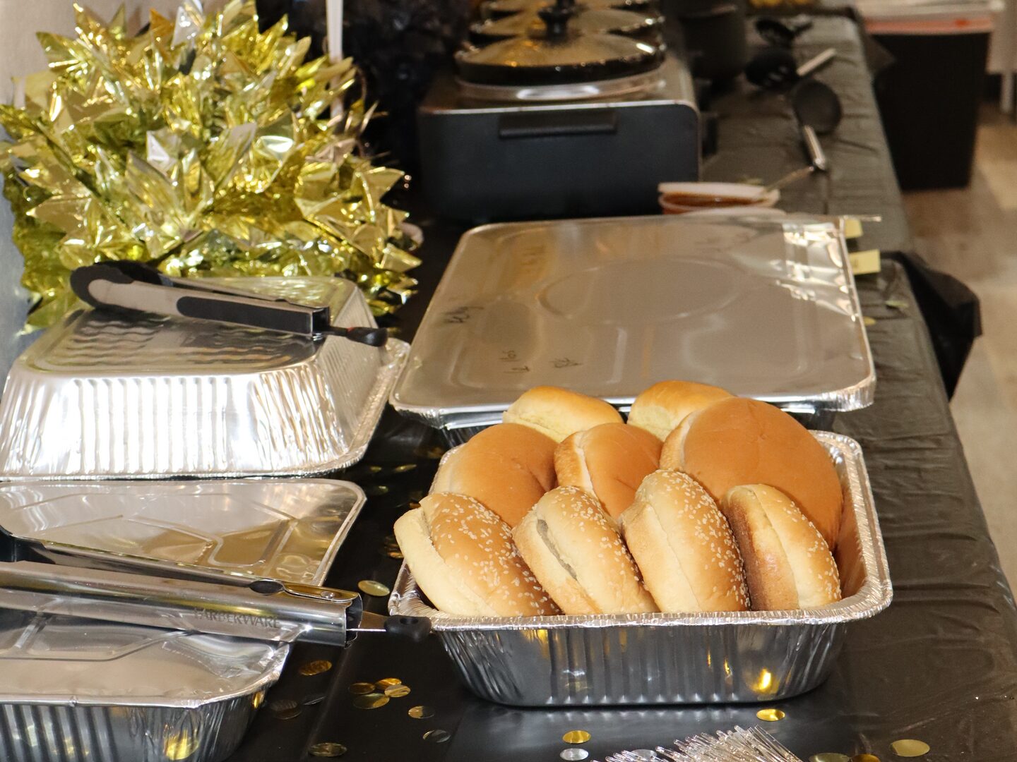 A spread of food on the table at Dual Cities NWA.